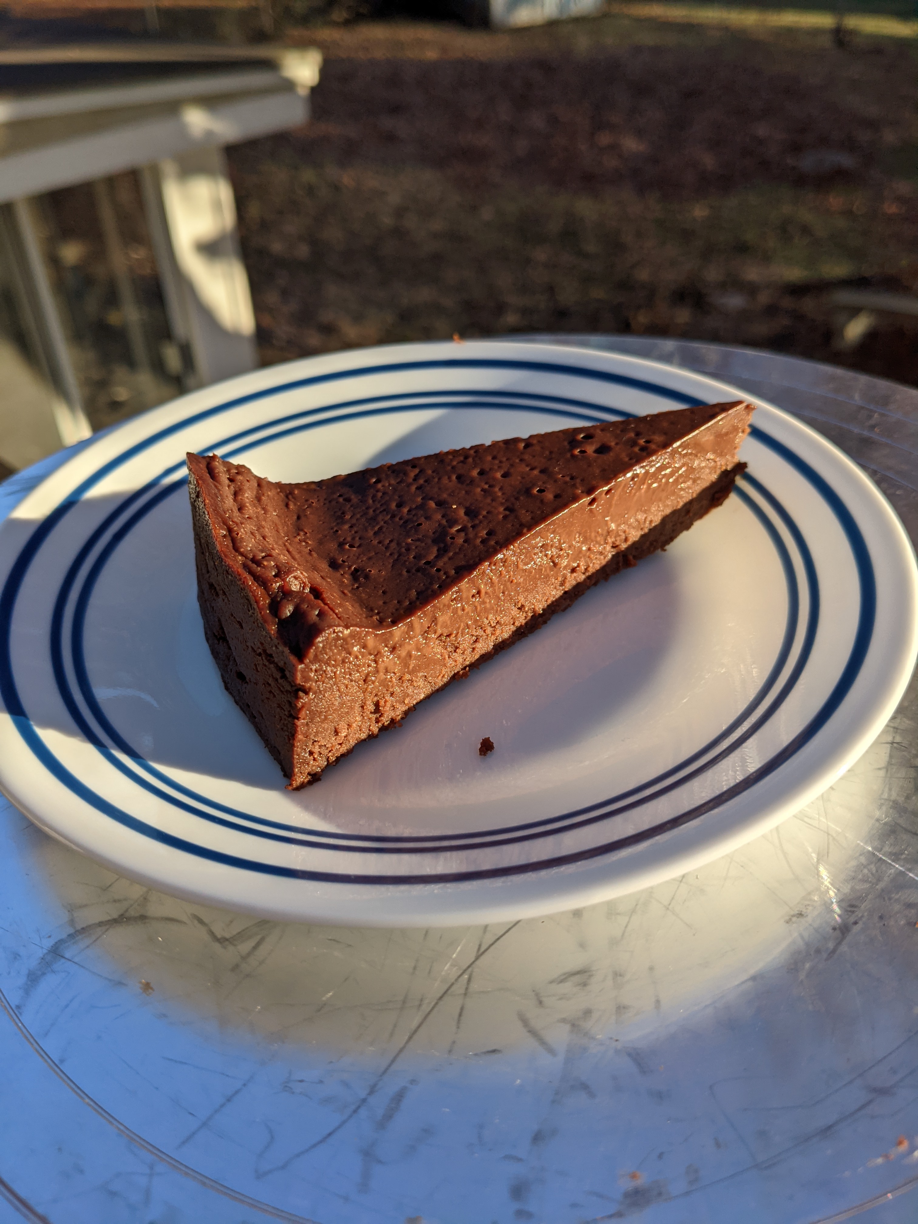A slice of flourless chocolate cake