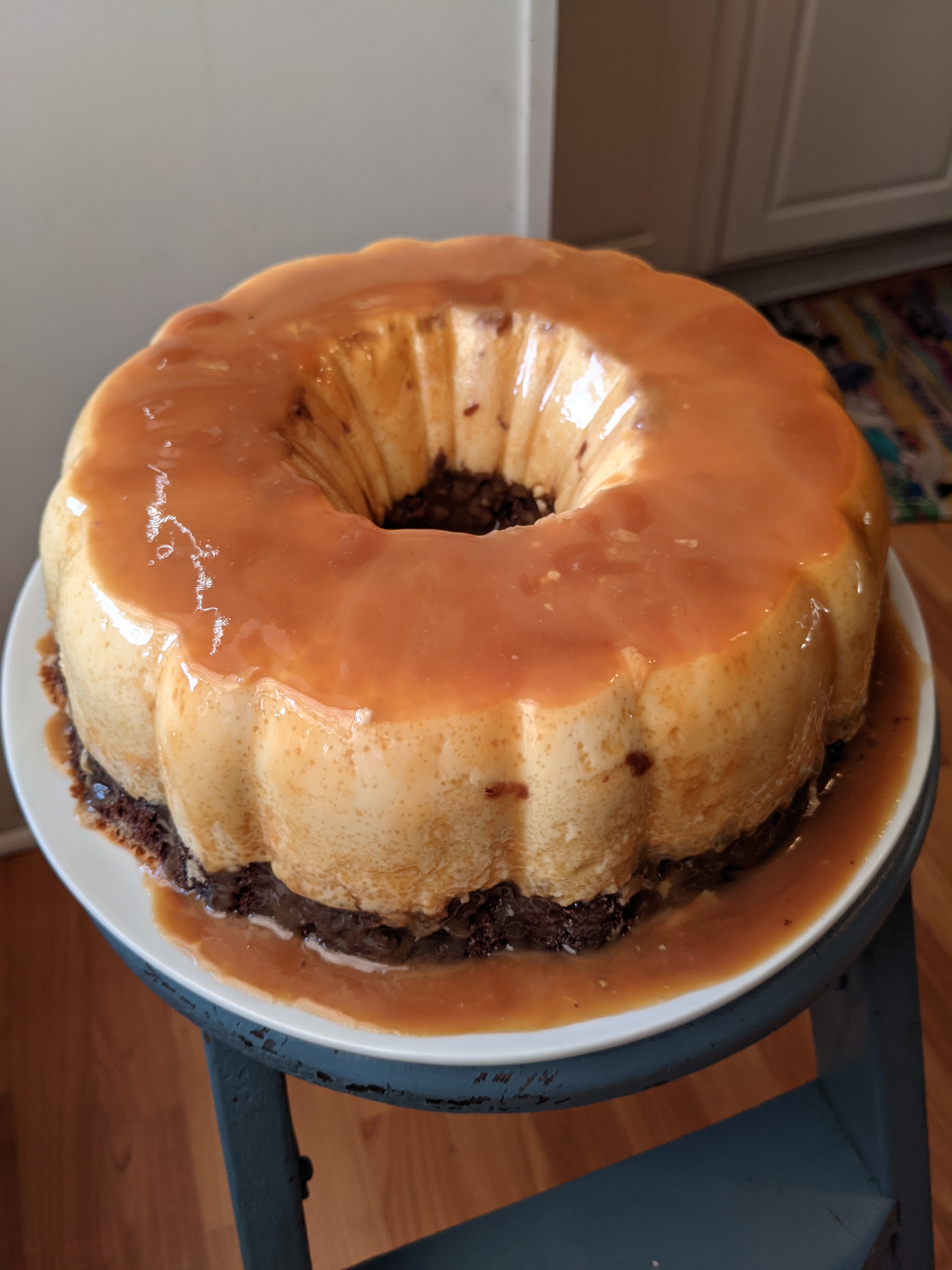 A flan cake with chocolate base layer